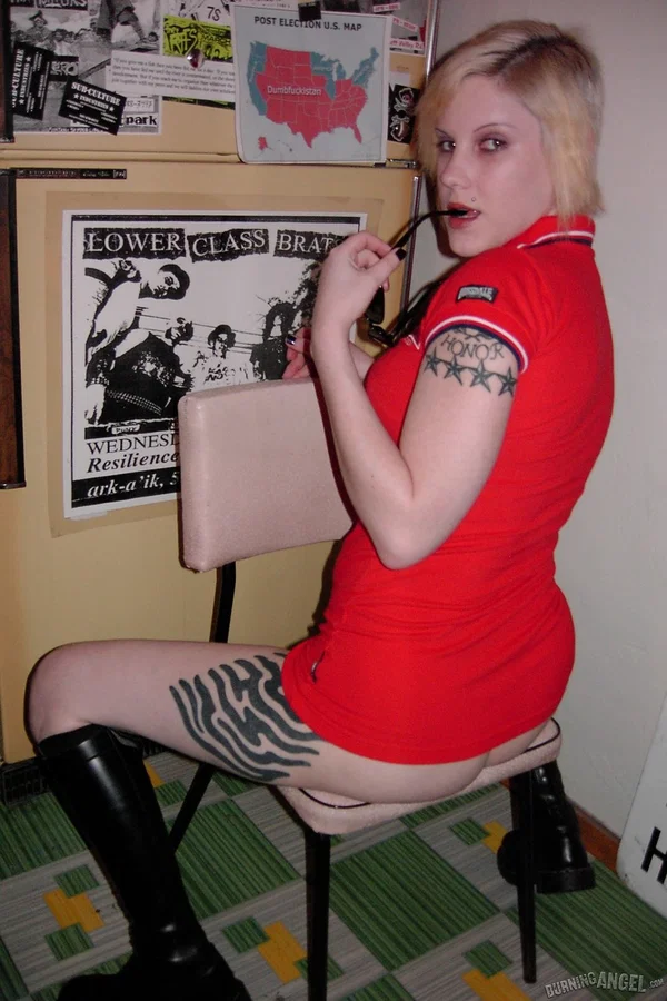 Sassy blonde fetish chick poses in skintight red dress flashing naked upskirt  - Fetish, Boots, Short Hair  - Photo 1