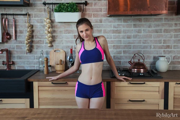 Slim teen with a tight ass gets completely naked on a kitchen counter  - Clothed, Ass, Kitchen, Shorts, Undressing, Cute, Teen, Skinny, Glamour, Model  - Photo 4