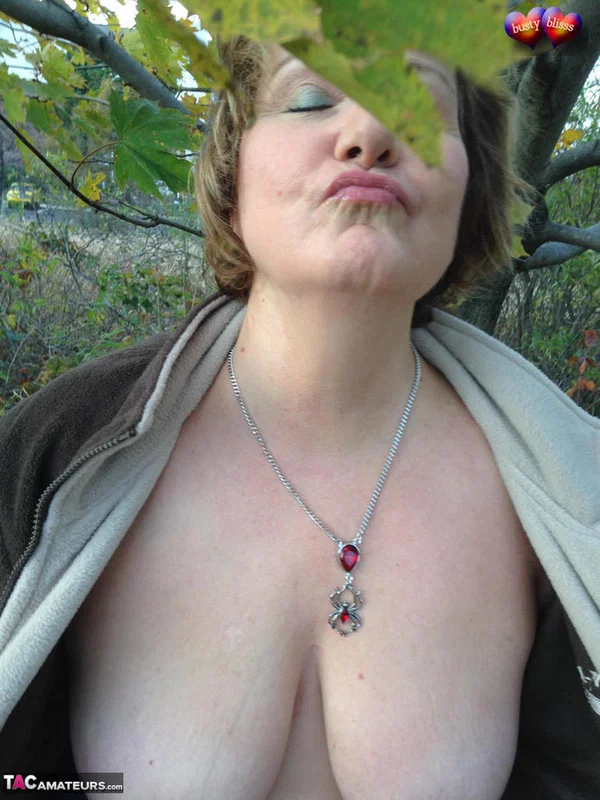 Older woman Busty Bliss exposes her big natural tits under a tree in the fall  - Mature, Saggy Tits, BBW, Amateur, Outdoor, Clothed, Curvy, Short Hair, Chubby, Thick  - Photo 9