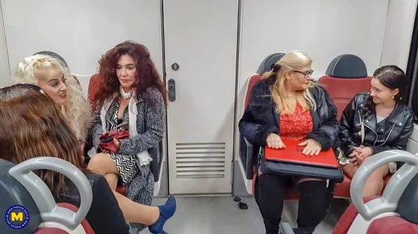 Old & young lesbians pose seductively on the couch after a train ride  - Mature, Spanish, MILF, Dress, Skirt, Latina, Amateur, Petite, Non Nude, Clothed  - Photo 5