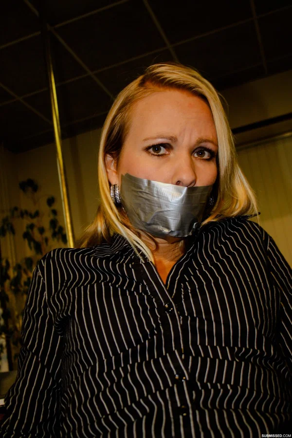 Curvy blonde secretary Natalie posing bound to a chair at the office  - Secretary, Bondage, Uniform, Office, Skirt, BDSM, Amateur, High Heels, Non Nude, Legs  - Photo 21