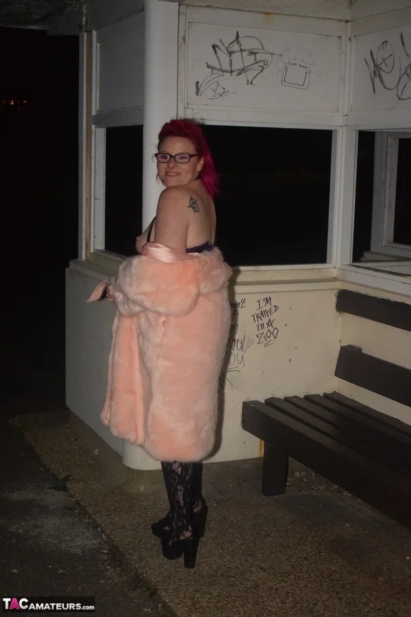 British redhead Mollie Foxxx models in glasses during a solo performance  - Stockings, Amateur, MILF, Glasses, Redhead, Lingerie, Outdoor, High Heels, Tattoo, Ass  - Photo 13