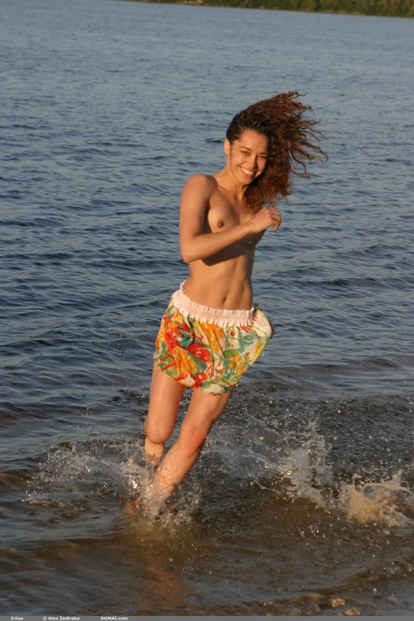 Nice teen poses totally naked on scrap metal before wading into the water  - Beach, Public, Babe, Teen, Outdoor, Glamour, Curly, Skinny, Solo, Brunette  - Photo 17