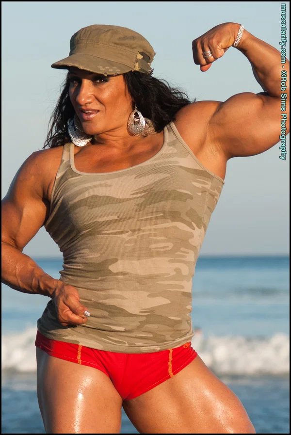 Bodybuilder Tonia Moore flexes her muscles on a beach in a faded marine cap  - Sports, Beach, MILF, Outdoor, Panties, PAWG, Ass, Brunette, Babe, Beautiful  - Photo 3