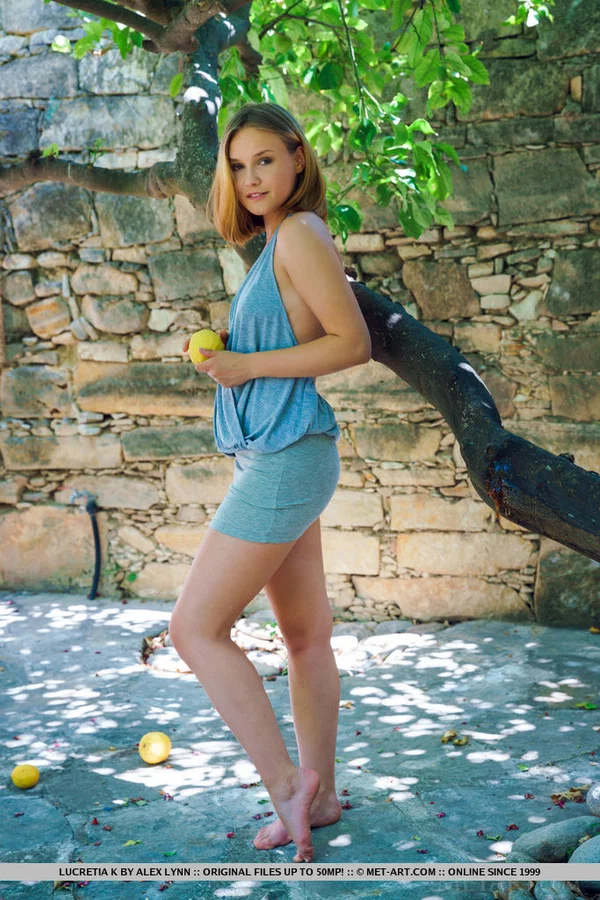 Pretty teen Lucretia K sets her exquisite body free of clothes in a courtyard  - Outdoor, Teen, Legs, Skirt, Blonde, European, Ass, Babe, Shaved, Glamour  - Photo 1