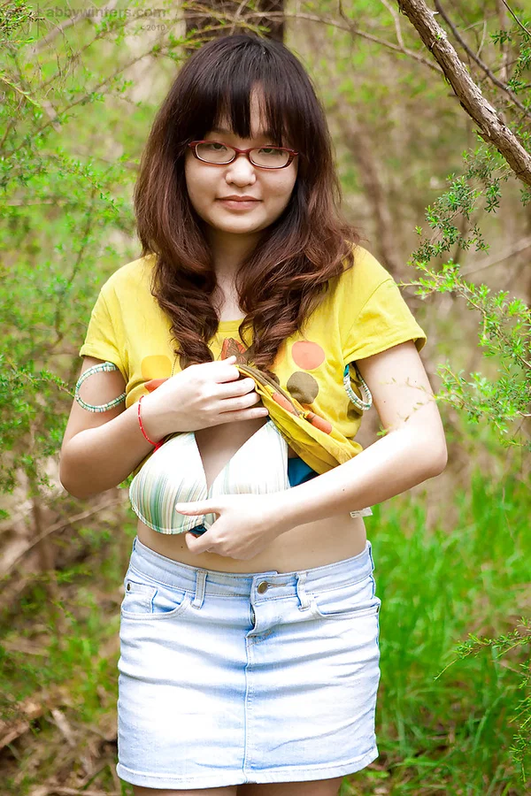 Petite Asian girl in glasses bares hairy vagina outdoors after slow strip  - Asian, Amateur, Outdoor, Glasses, Hairy, Panties, Close Up, Brunette, Undressing, Feet  - Photo 4