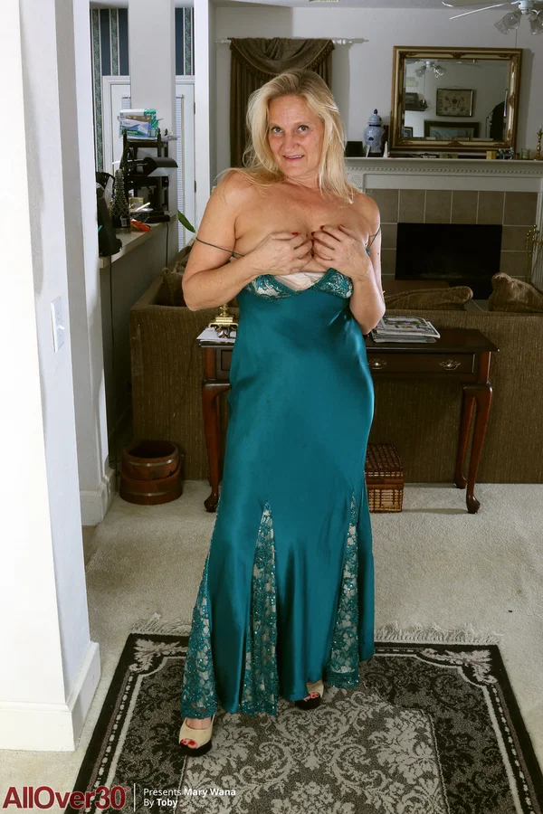 Mature blonde Mary Wana shows off her saggy tits during a sexy striptease  - Mature, Amateur, Big Tits, Blonde, Upskirt, Undressing, High Heels, Skirt, Feet, Panties  - Photo 5