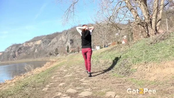 Redheaded girl Sandra pees on a path while walking near the water  - Pissing, Public, Czech, Redhead, Non Nude, Glasses, Outdoor, Pussy, Spreading, Close Up  - Photo 14