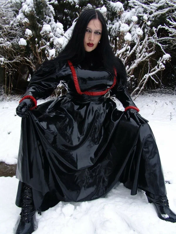 Goth woman Lady Angelina models a black latex dress on snow-covered ground  - Fetish, Latex, MILF, Clothed, Outdoor, Non Nude, Brunette  - Photo 6