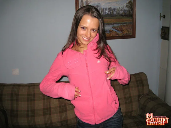 Brunette amateur unveils her skinny body while getting naked on a sofa  - Stripper, Jeans, Socks, Lingerie, Undressing, Spreading, Cute, Clothed, Pussy, Natural Tits  - Photo 1