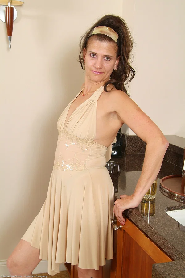 Mature amateur Vanessa S fingers and washes her hungry pussy in the kitchen  - Mature, Dress, Amateur, Big Clit, Skirt, Pussy, Close Up, Clothed, Panties, Spreading  - Photo 4