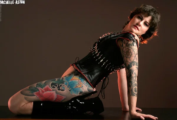 Tattooed brunette Michelle Aston shows her hairless pussy in fetish apparel  - Mature, MILF, Leather, Fetish, Boots, Tattoo, High Heels, Spreading, Pussy, Shaved  - Photo 11