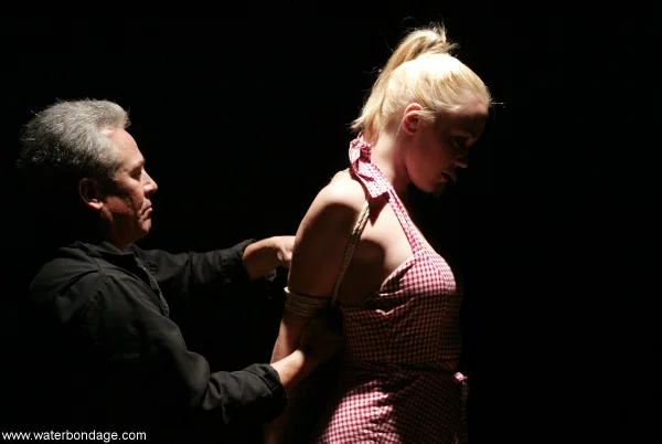 Sexy blonde Annette Schwarz is subjected to a man during water bondage action  - Blindfold, Bondage, German, BDSM, Fetish, Skirt, Dress, MILF, High Heels, Upskirt  - Photo 8