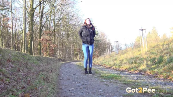 White girl Amanda Hill pulls down her jeans to pee on a gravel road  - Pissing, Public, Jeans, Pussy, Close Up, Redhead, Hairy, Outdoor, Czech, Spreading  - Photo 2