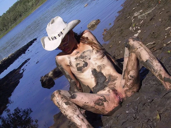 Skinny babe in a cowboy hat flaunts her tiny tits & spreads naked in the mud  - Beach, Wet, MILF, Outdoor, Fetish, Tiny Tits, Ass, Glasses, Asshole, Amateur  - Photo 6