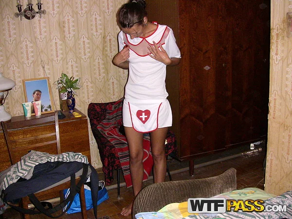 Amateur chick Dasi West poses non nude in a naughty nurse outfit on a bed  - Homemade, Skinny, Non Nude, Amateur, Shorts, Babe, Brunette, Beautiful, Solo  - Photo 1