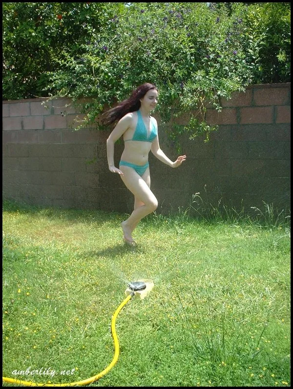 Pale chick Amber Lily exposes her ass while wetting herself with a garden hose  - Bikini, Non Nude, MILF, Ass, Amateur, Outdoor, Mature, Solo, PAWG, Babe  - Photo 11