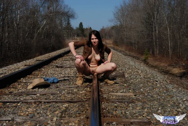 Young amateur Emily Love exposes herself on railway tracks in a hat and boots  - Outdoor, Beautiful, Amateur, Shorts, Spreading, Teen, Clothed, Cute, Babe, Solo  - Photo 9
