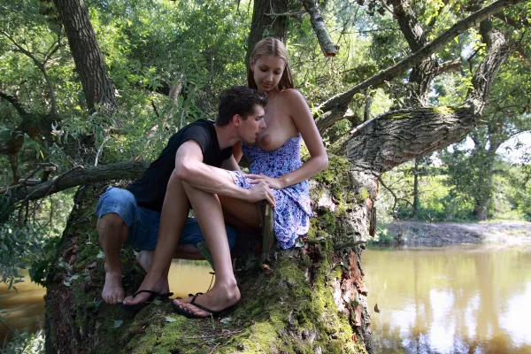 Young lovers have sexual intercourse on a tree limb over a body of water  - Pussy Licking, Amateur, Cute, Teen, Doggy Style, Outdoor, Ass Fucking, Reality, Skirt, Hardcore  - Photo 2