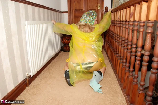 Blonde amateur Jessicas Honeyz strikes sexy poses a see-through raincoat  - Fetish, MILF, Amateur, Blonde, Panties, Big Tits, European, Ass, Legs, High Heels  - Photo 17