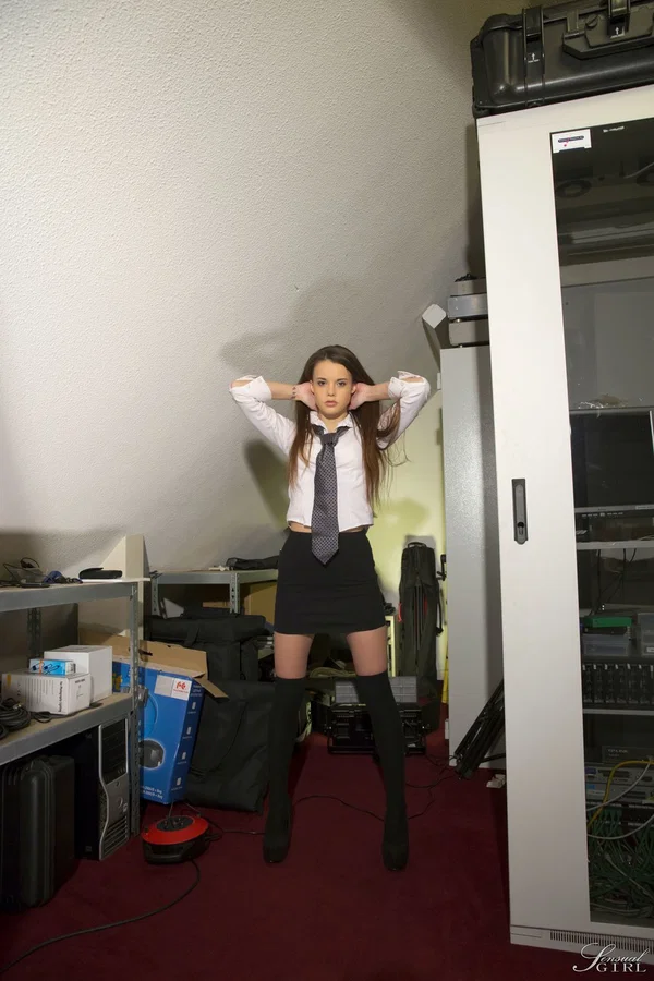 Brunette Hungarian teen Baby Jewel doffs her work clothes and touches her clam  - Skirt, Teen, Uniform, Clothed, Stockings, Office, High Heels, Cute, Spreading, White  - Photo 3