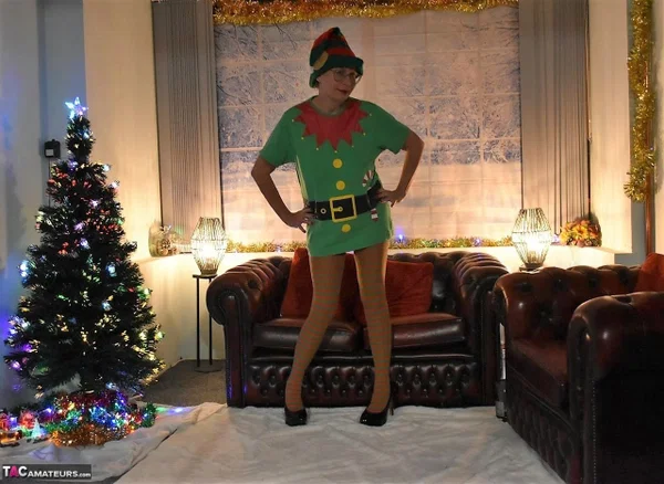 Older British woman Barby Slut goes nude in stockings at Christmas  - Christmas, Cosplay, Saggy Tits, Mature, Glasses, Stockings, Short Hair, Skirt, High Heels, Pantyhose  - Photo 2