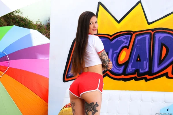 Tattooed girl Luna Lovely flaunts her big butt on her knees by stripper pole  - Ass, Tattoo, Outdoor, Babe, Pussy, Socks, Close Up, Shaved, Panties, Shorts  - Photo 2
