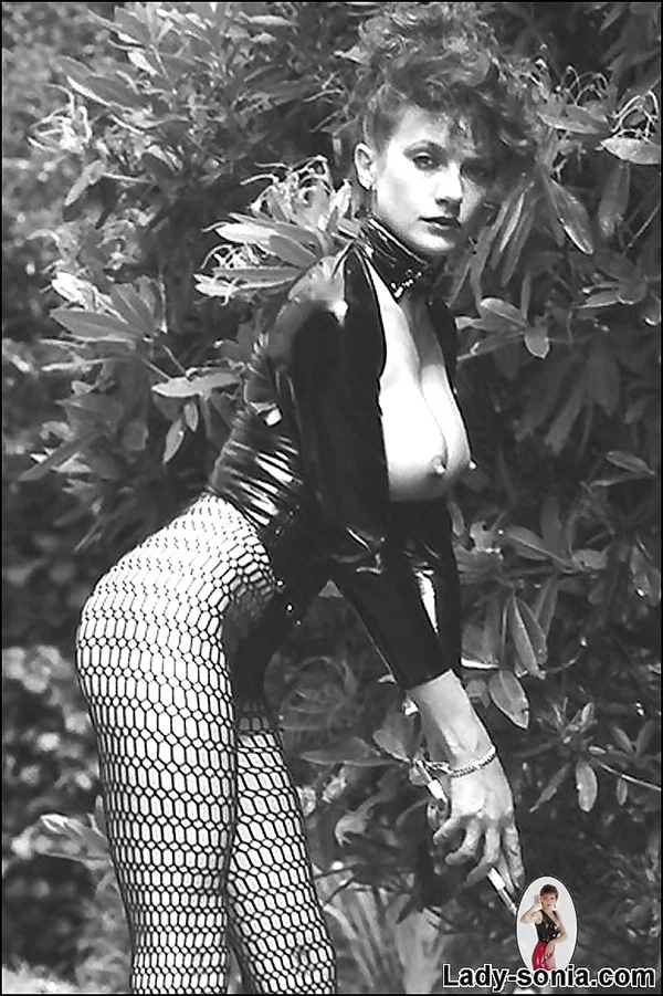 Leggy lady in fetish outfit exposing her boobs in vintage photo set  - Lingerie, Pantyhose, Mature, Fetish, Outdoor, Big Tits, Fake Tits, Vintage  - Photo 9