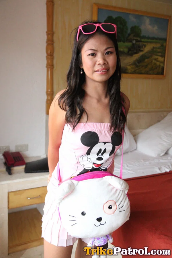 Petite Asian first timer removes Mickey Mouse top on way to getting naked  - Photo 1