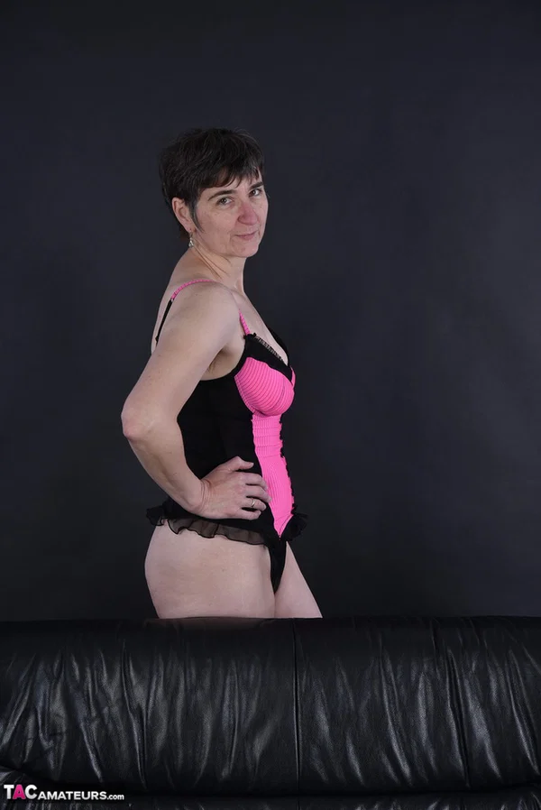 Older amateur Hot MILF sports short hair while freeing her tits from lingerie  - Mature, Amateur, Lingerie, Socks, Short Hair, Brunette, Nipples, Tiny Tits, Panties, European  - Photo 2