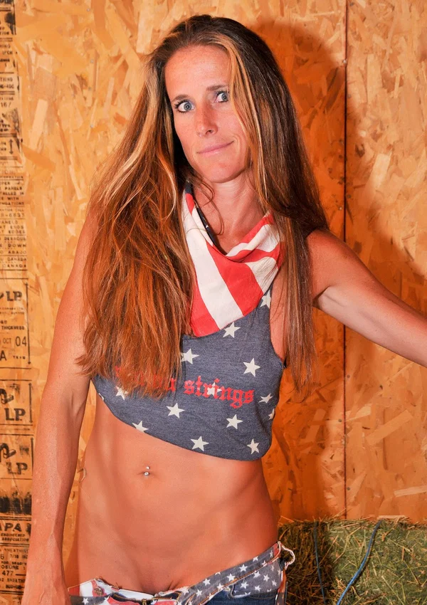 Tanned American MILF Sofie Marie teasing with her big booty in a solo  - MILF, Redhead, Shorts, Beautiful, Tall, Ass, Babe, Tiny Tits, Pornstar, Natural Tits  - Photo 10