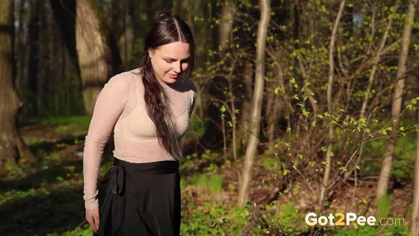 Nice girl Violet Rilz takes a piss on a rock by a pond in a black skirt  - Pissing, Outdoor, Curvy, Chubby, Thick, BBW, Panties, Shaved, Skirt, Close Up  - Photo 2