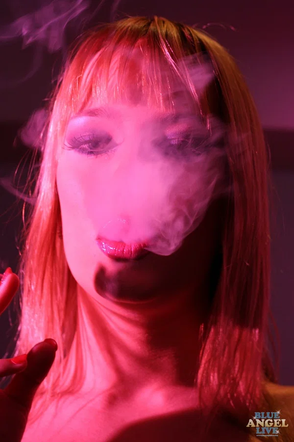 Beautiful Blue Angel smoking a cigarette in this smoking fetish  - Sexy, Pornstar, Blonde, European, Non Nude  - Photo 15