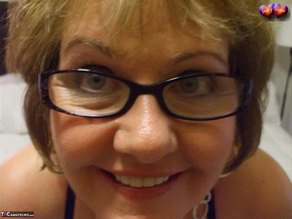 Mature mom Busty Bliss in sexy lingerie disrobes to let her big tits hang  - Mature, BBW, Chubby, Amateur, Glasses, Big Tits, Lingerie, Curvy, Thick, Face  - Photo 2
