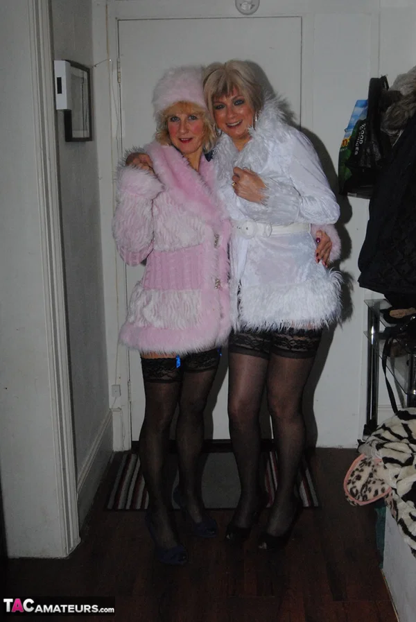 Mature blondes strips off winter attire and lingerie in side by side action  - Mature, Amateur, Lesbian, Stockings, Blonde, Big Tits, European, Panties, Nipples, High Heels  - Photo 1