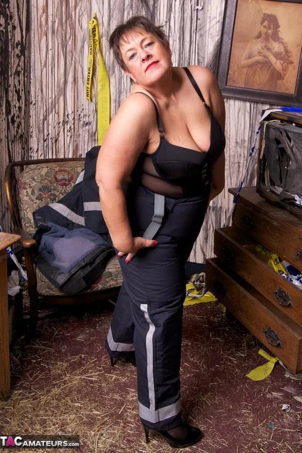 Mature fatty doffs her firefighter clothing to show her twat in stockings  - Mature, BBW, Amateur, Stockings, Brunette, Short Hair, Chubby, Uniform, European, Clothed  - Photo 14