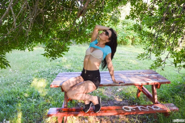 Brunette teen Shana Lane works her tits loose outdoors on a picnic table  - Glasses, Shorts, Beautiful, Outdoor, Nipples, Natural Tits, Ass, Amateur, Tiny Tits, Solo  - Photo 5