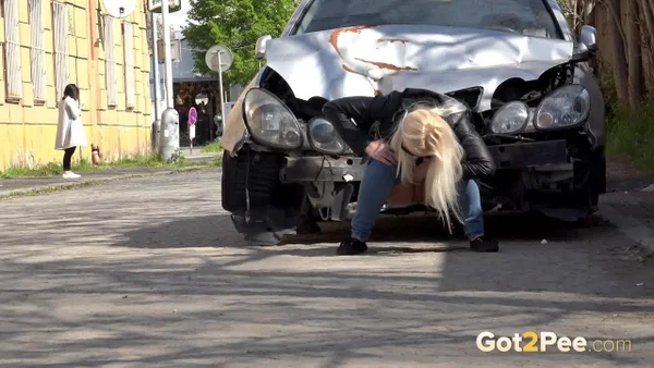 Blonde chick Morena squats afore a car for an urgent pee on a public road  - Public, Pissing, Jeans, Glasses, Blonde, Pussy, Babe, Shaved, Clothed, Close Up  - Photo 9
