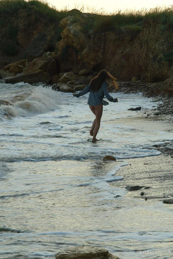 Nice teen girl Petra E removes her shirt after wading out into the ocean  - Beach, Outdoor, Teen, Wet, European, Hairy, Babe, Tiny Tits, Legs, Nipples  - Photo 1