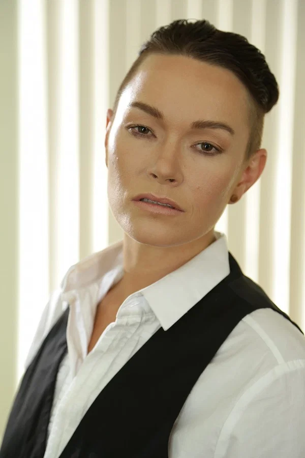 Androgynous short haired model Jiz Lee posing in her male outfit  - Short Hair, MILF, Pornstar, Petite, Clothed, Brunette, Face, Non Nude, White  - Photo 2