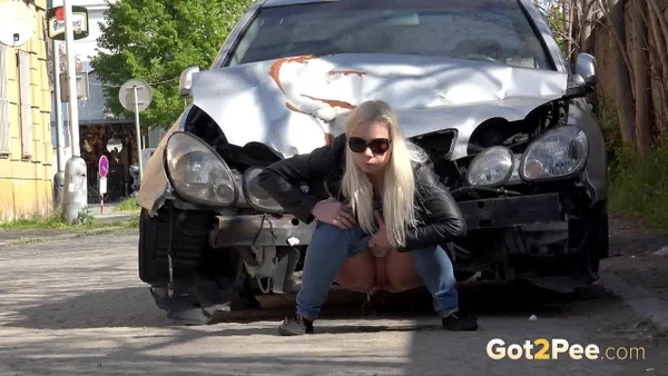 Blonde chick Morena squats afore a car for an urgent pee on a public road  - Public, Pissing, Jeans, Glasses, Blonde, Pussy, Babe, Shaved, Clothed, Close Up  - Photo 10