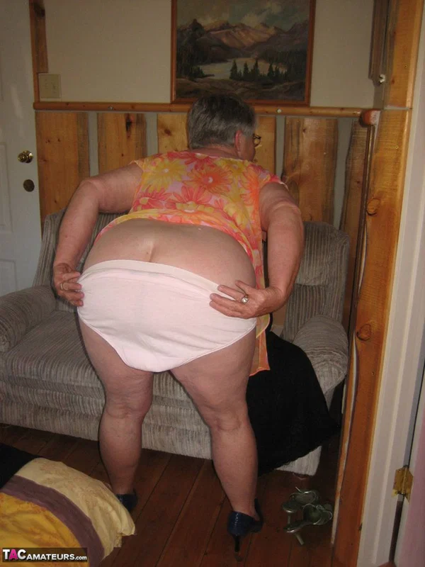 Obese granny Girdle Goddess wakes up from a nap and precedes to strip naked  - Granny, SSBBW, BBW, Amateur, Skirt, Chubby, European, Thick, Curvy, Glasses  - Photo 13