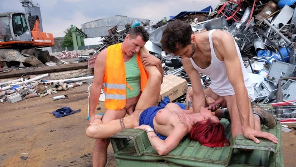 Redhead MILF with tattoos and fake tits gets banged in a junk yard 3some  - German, Blowbang, Gangbang, Tattoo, Ass, Groupsex, Upskirt, PAWG, Redhead, Cumshot  - Photo 13