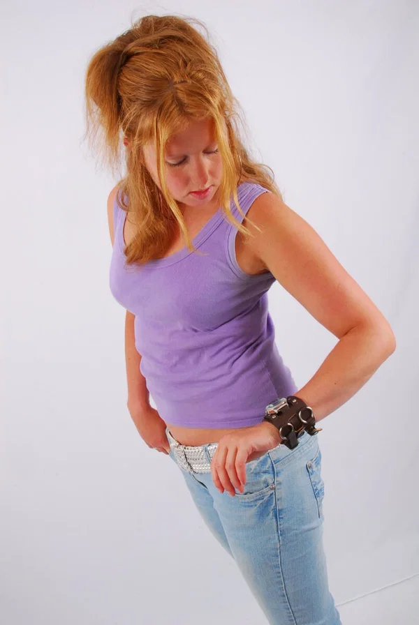 Natural redhead models a large cuff watch in a tank top and faded jeans  - Jeans, Amateur, Redhead, Clothed, Beautiful, Solo, Ass, PAWG, Babe, Non Nude  - Photo 2