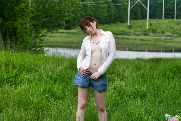 Amateur girl with red hair Barbie A exposes her tits while in a grassy field  - Amateur, Outdoor, Redhead, Clothed, Pigtails, Legs, Skirt, Big Tits, Upskirt, Tattoo  - Photo 5