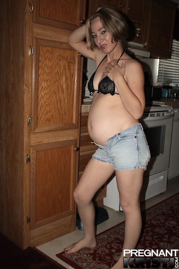 Heavily pregnant girl doffs bikini top and denim shorts to model totally naked  - Pregnant, Amateur, Shorts, Kitchen, Babe, Ass, Tiny Tits, Undressing, Solo, Beautiful  - Photo 2