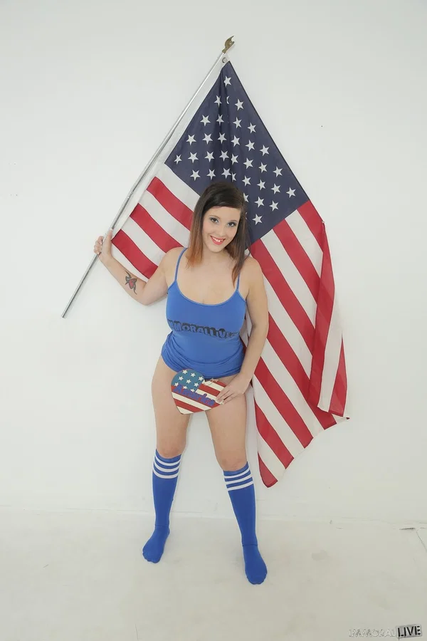 Patriotic brunette honey wrapped up in a flag bares her big natural tits  - Teen, Pornstar, White, Cute, Brunette  - Photo 9