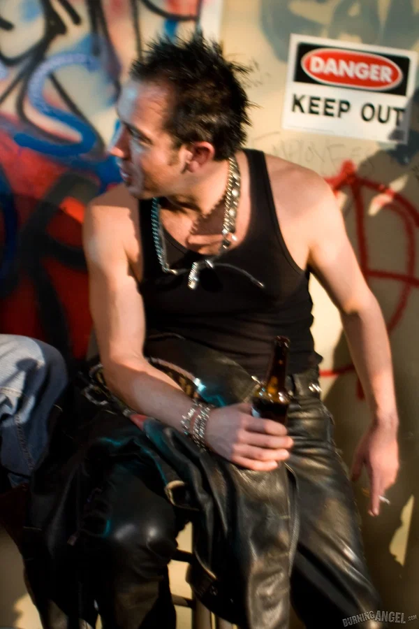 Slutty chick with dyed hair is forced into oral sex at biker's club  - Arab, Jeans, Clothed, Ass Licking, Piercing, MILF, Handjob, Blowjob, Kissing, Glasses  - Photo 5