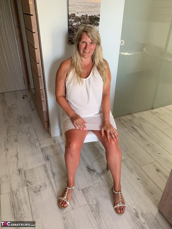 Thick older woman Sweet Susi exposes tan lined tits after hiking up her dress  - BBW, Mature, Chubby, Thick, Saggy Tits, MILF, Curvy, Amateur, Clothed, Spreading  - Photo 1