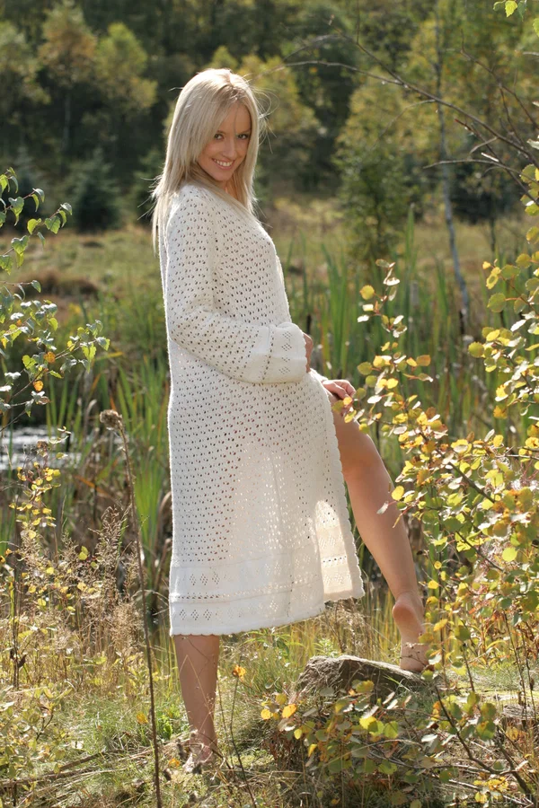 Young blonde slips out of a sheer sweater to display her totally naked body outd  - Outdoor, Babe, Perfect, Beautiful, Teen, Ass, Skinny, Tiny Tits, Undressing, Glamour  - Photo 4